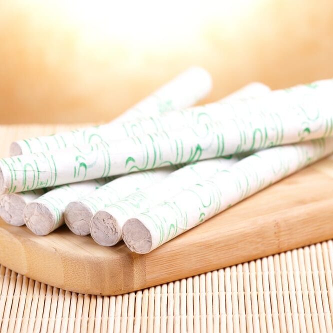 A close up of some sticks on a cutting board